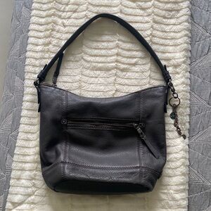 The SAK  brand leather handbag.